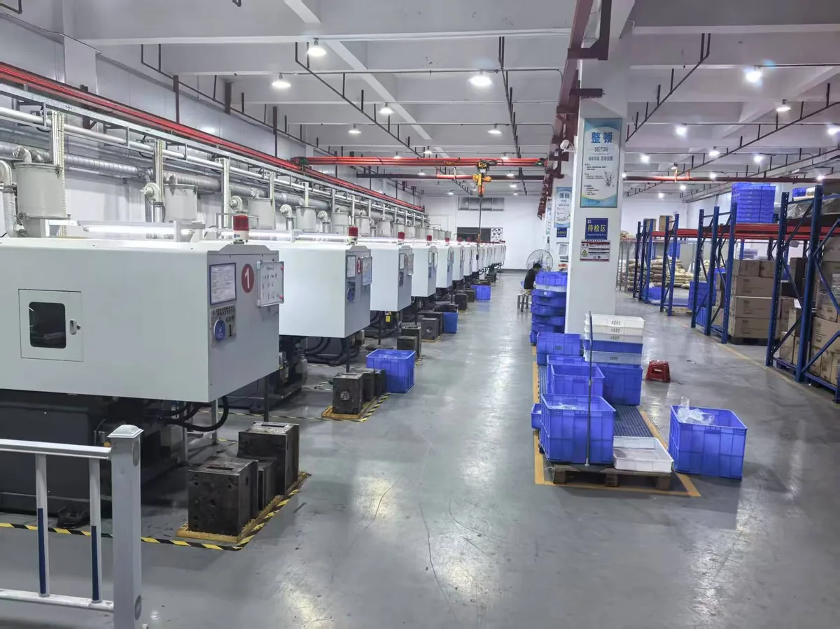 Injection molding workshop — servo machines in production run
