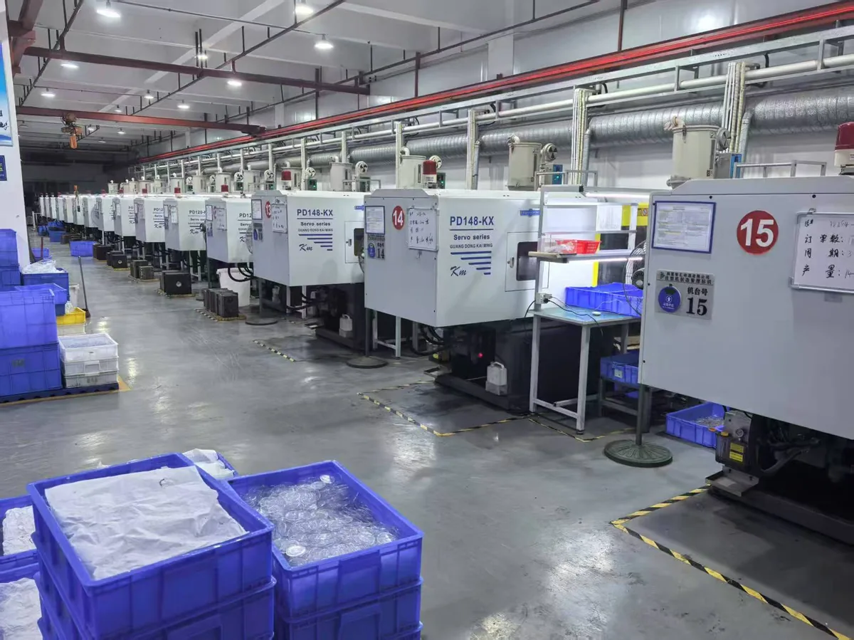 Injection molding workshop — wide-angle view of machine bank