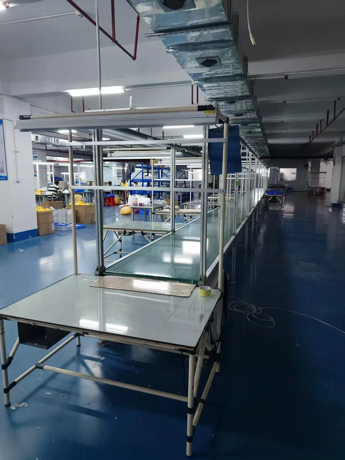 Packaging workshop — full assembly line overview